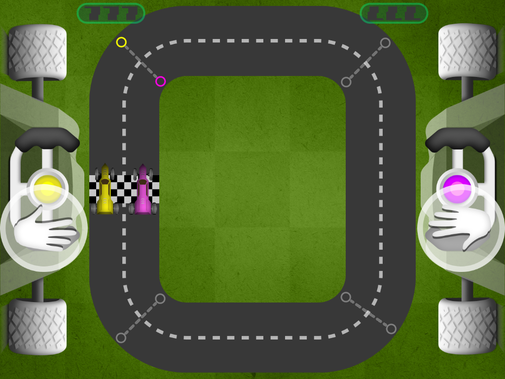 Duże kierownice - kontrolery w grze i wyraźne kontrastujące z tłem gry kolory aut